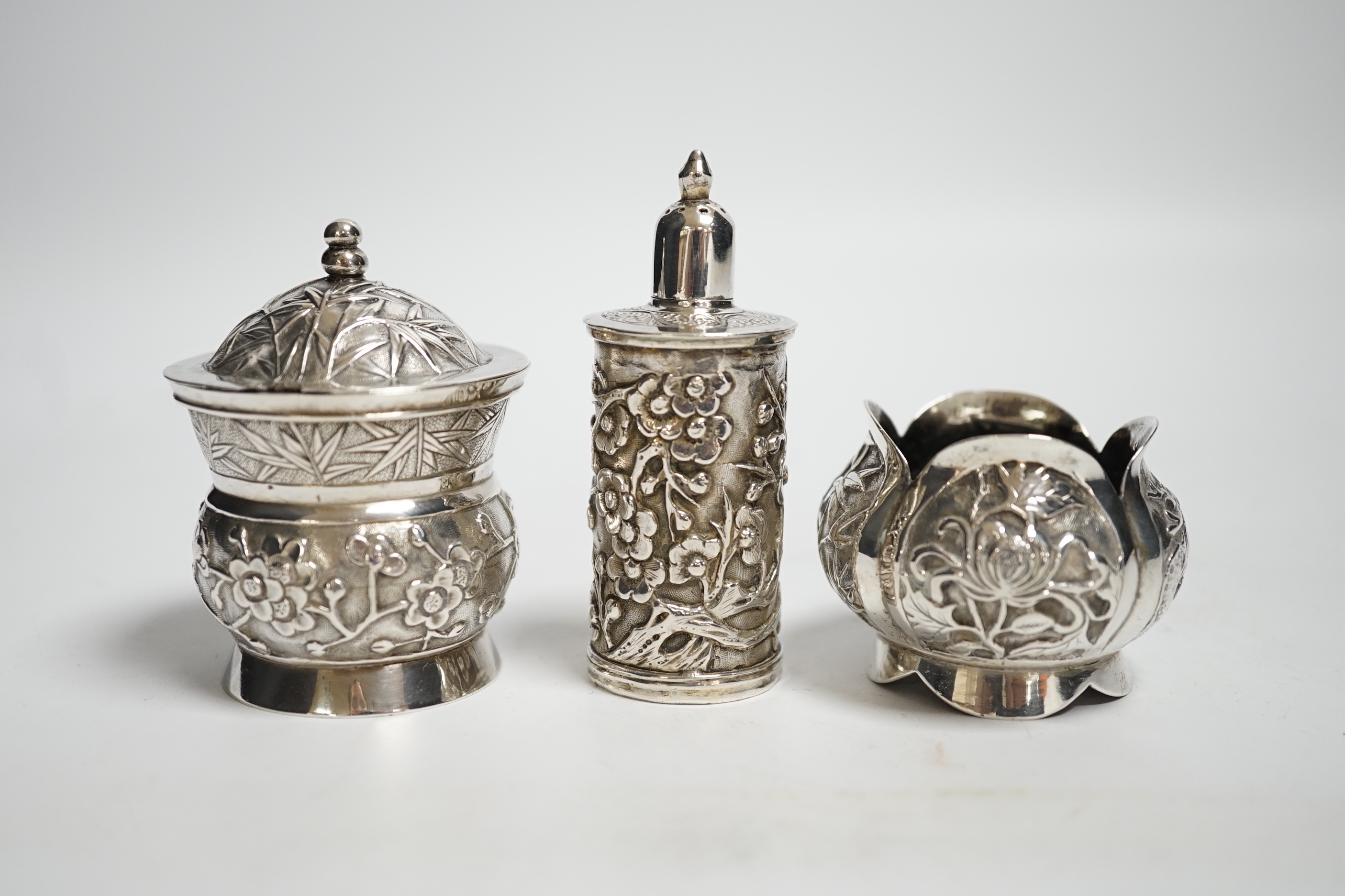 An early 20th century Chinese Export white metal three piece condiment set by Wang Hing, Hong Kong, 147 grams.